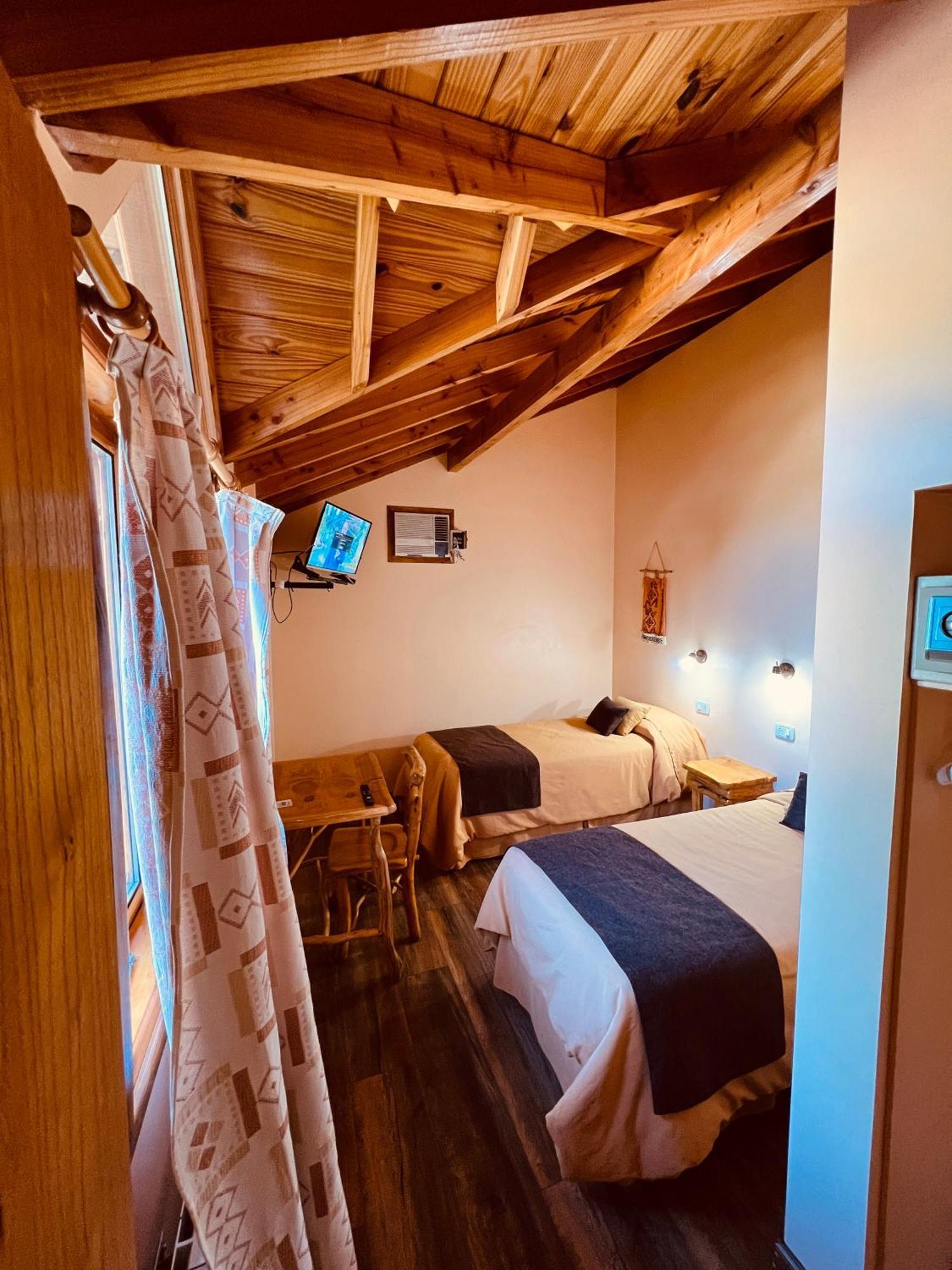 Hotel Y Cabanas Casa De Piedra Trevelín Esterno foto